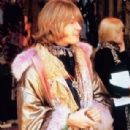 Brian Jones of The Rolling Stones wears a gold and pink ensemble complete with lace, jewelry and fur trim at the Monterey Pop Festival, 1967. He was later dubbed ‘Prince Jones’ in the song Monterey - 308 x 431