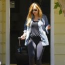 Christine Ouzounian is spotted leaving her home in Santa Monica, California and heading to a meeting in Century City on August 14, 2015 - 452 x 600