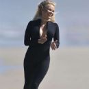 Pamela Anderson – Films Ultra Tune TV ad on Gold Coast Beach in Queensland