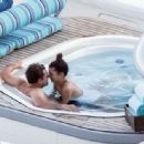 Camila Morrone in White Swimsuit with Leonardo DiCaprio on holiday in Positano