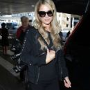 Paris Hilton and Fiance Chris Zylka at LAX airport in LA
