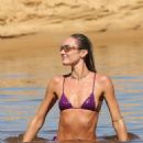 Candice Swanepoel – Seen in two-piece bikini in Trancoso