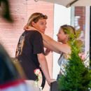 Millie Bobby Brown – Flashes a diamond ring while on the PDA with boyfriend Jake Bongiovi - 454 x 580