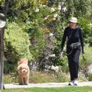 Marcia Cross – walking her dog in Los Angeles - 454 x 497