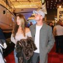 DAVID COULTHARD British Formula 1 Racing Driver With girlfriend SIMONE ABDELNOUR Attending the London Boat Show - 454 x 695