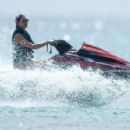 Lauren Silverman – Ride on jet skis on holiday in Barbados