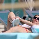 Michelle Hunziker – Seen in Red Bikini at Alpemare Beach in Forte Dei Marmi, Italy - 454 x 303