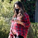 Olivia Munn – reveals her growing baby bump in Los Angeles