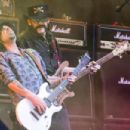 Lemmy and Phil Campbell from Motorhead performs on The Pyramid Stage during the Glastonbury Festival at Worthy Farm, Pilton on June 26, 2015 in Glastonbury, England - 454 x 302