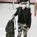 Cyndi Lauper – With husband David Thornton arrive at JFK Airport in New York - 454 x 681