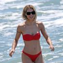 Michelle Hunziker – Seen in Red Bikini at Alpemare Beach in Forte Dei Marmi, Italy - 454 x 681