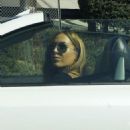 Christine Ouzounian stops to fill up her new Lexus in Newport Beach, California on August 13, 2015 - 454 x 550