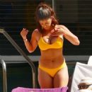 Erika Medina in Yellow Bikini in Las Vegas - 454 x 544