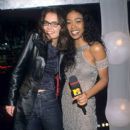 Katie Holmes and Ananda Lewis - MTV New Year's Eve 1998 - 406 x 612
