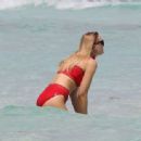 Grace Levy in Red Bikini on the beach in Tulum - 454 x 337