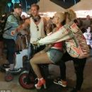 Amber Rose and Odell Beckham Jr. Riding a Scooter at the Coachella Valley Music And Arts Festival in Indio, California - April 15, 2017