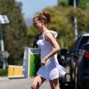 Kate Mara – Rocks in mini white dress while leaving Aritzia store in Beverly Hills