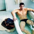 Leaving little to the imagination, a Speedo clad Michael Phelps soaks in a bath for his new ad campaign for Louis Vuitton - 454 x 325