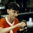 Kyle (DJ Qualls) pours syrup on his French toast, unaware that it already has some added ingredients, in Dreamworks' comedy Road Trip - 2000