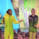 Pharrell Williams and Kaley Cuoco - Nickelodeon Kids Choice Awards 2014 - 426 x 612