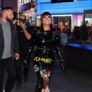 Demi Lovato – Taking photos on her digital Time Square billboard in New York - 454 x 681