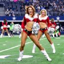 Dallas Cowboys Cheerleaders in Santa Suits – Performing an NFL football game in Arlington - 454 x 351