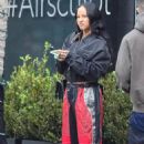 Karrueche Tran &#8211; In a baggy Nike track pants with her family at Jon and Vinny&#8217;s Pizza in LA