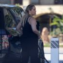 Elizabeth Berkley – Fills up her tank with $7 a gallon gas in Los Angeles - 454 x 706