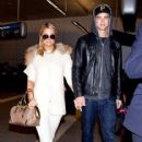 Paris Hilton and River Viiperi arrive at LAX (Los Angeles International Airport)