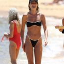 Montana Cox – In a black bikini at the beach in Sydney - 454 x 681