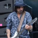 Phil Campbell from Motorhead performs on The Pyramid Stage during the Glastonbury Festival at Worthy Farm, Pilton on June 26, 2015 in Glastonbury, England - 403 x 600