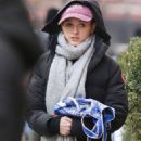 Natalia Dyer – Braves the cold while stopping at a smoke shop in Manhattan - 454 x 743