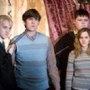 (L-r) TOM FELTON as Draco Malfoy, MATTHEW LEWIS as Neville Longbottom, JAMIE WAYLETT as Vincent Crabbe and EMMA WATSON as Hermione Granger in Warner Bros. Pictures' fantasy 'Harry Potter and the Order of the Phoenix.” Photo by Murray Close. - 454 x 303