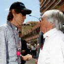 L'Wren Scott and Mick Jagger on the grid ahead of the Monaco F1 race, May 16, 2010 in Monte Carlo, Monaco - 454 x 329
