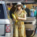 Paris Hilton -In a yellow dress out in Malibu
