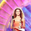 Keri Russell attends The 56th Annual Golden Globe Awards - Press Room (1999)