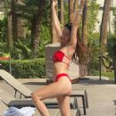 Iva Kovacevic – In a red bikini at her luxury pool in Las Vegas - 454 x 649
