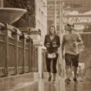 CM Punk and Lita walking in the rain - 454 x 255