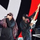 Tom Morello of Prophets of Rage performs onstage during KROQ Almost Acoustic Christmas 2017 at The Forum on December 9, 2017 in Inglewood, California - 454 x 302
