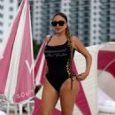 Larsa Pippen &#8211; In a black one-piece swimsuit at the beach in Miami