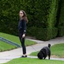 Troian Bellisario – Out for a walk with her dog in Los Angeles - 454 x 443