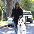 Billy Ray Cyrus takes his dogs out for a relaxing stroll through his neighborhood in Toluca Lake, California on April 4, 2014 - 454 x 589