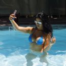 Suelyn Medeiros in Blue Bikini at luxury hotel in Los Angeles