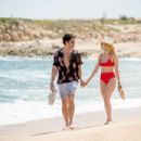 Claudia Lee in Red Bikini at the beach in Cancun - 454 x 303