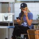 Paris Hilton – With her puppy out in Hollywood