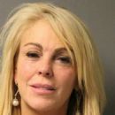 Dina Lohan is seen in her booking photo following her DUI arrest - 454 x 568