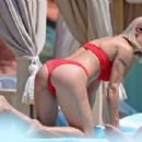 Michelle Hunziker – Seen in Red Bikini at Alpemare Beach in Forte Dei Marmi, Italy - 454 x 303