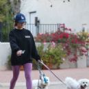 Lucy Hale – Walks her two white dogs in Studio City