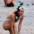 Rachel Bilson – In a one piece swimsuit on the beach in Hawaii