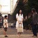 Left to Right: Xu Jiao as Dicky Chow, Kitty Zhang as Miss Yuen and Stephen Chow as Ti Chow. © 2007 Star Overseas Group, Courtesy Sony Pictures Classics. All Rights Reserved.